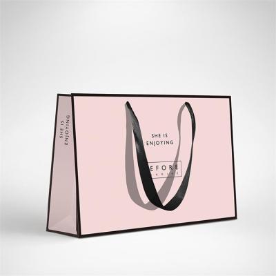 China Recyclable Custom Logo Printed Euro Luxury Retail Merchandise Packaging Cardboard Kraft Art Paper Shopping Bags For Garments / Apparel for sale