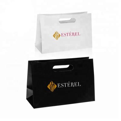 China Recyclable White Custom Printed Carry Reinforced Die Cut Handle Shopping Paper Bag With Logo for sale