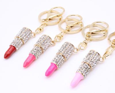 China Trendy Women Jewelry Charm Crystal Lip Gloss Key Chain Rhinestone Key Holder Ring Lipstick Key Chain For Women's Bag Accessories for sale