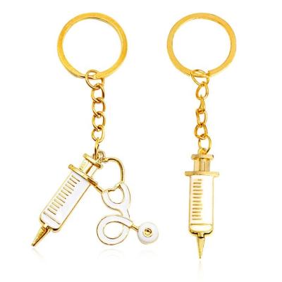 China Advertising Cheap Wholesale Promotion Key Chain Resin Molds For Keychains Medical Student Graduation Keyrings Custom Gold Metal Nurse Injection Key Chain for sale