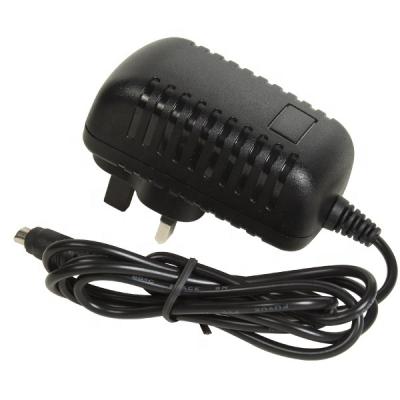 China UK 3 pin wall plug in 18w universal charger 12v 1500ma 12v 1.5a power adapter for camara XYYU-120150 for sale