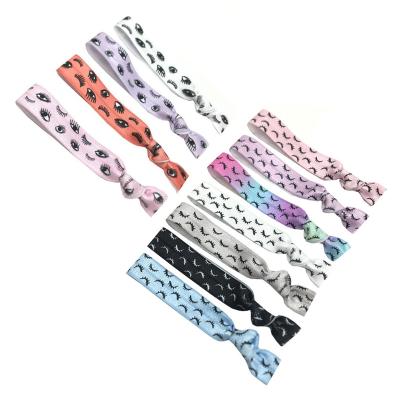 China Nylon Spandex 11 Colors 300pcs Good Selling Eyelashes Printed Knotted Elastic Hair Band Bracelet Girls Ponytail Holder Wristband for sale