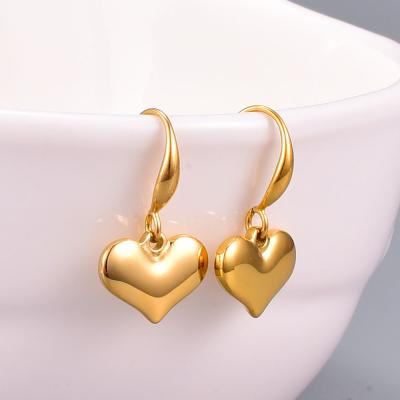 China lead and nickel free 2021 hot 18K gold heart charm circle titanium steel earrings peach plain style solid charm earrings for girls for sale