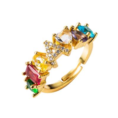 China REAL Personality Environmental Friendly Creative Gemstone Gold Plated 26 LETTER Design Copper Rings Adjustable Crystal Rings Ins Jewelry for sale