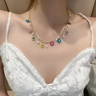 China New Style Prenty Style Natural Pearl Necklace 18K Gold BOHO Baroque Freshwater Pearl Colorful Polymer Clay Flower Charms Necklace Environmental Friendly Gold for sale