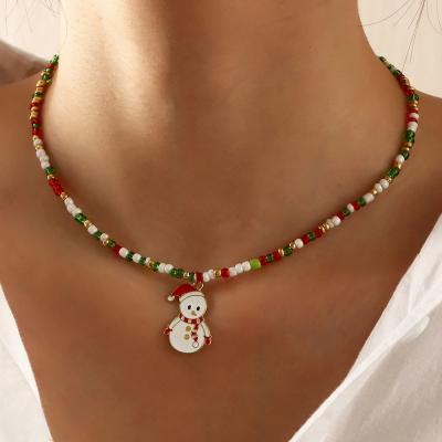 China Beautiful Fashion New Christmas Environmental Friendly Simple Handmade Plastic Beads Scarf Oil Dropped Snowman Charm Christmas Necklace For Girl for sale