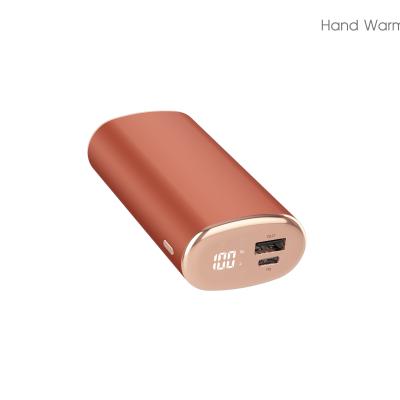 China 2021 Mobile Phone/PSP/Table/GPS/MP3/4/Camera/Laptop 2021 Mini Patent Model New Design Power Bank Pocket Hand Warmer Rechargeable Power Bank for sale