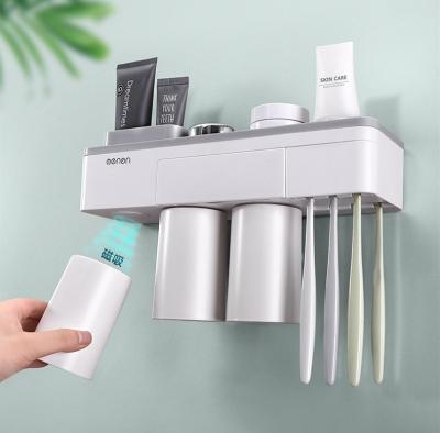 China Bathroom Toothbrush Holder Mouthwash Cup Shelves Shower Bathroom Wall Suction Brush Cup Holder Tier Drilling for sale