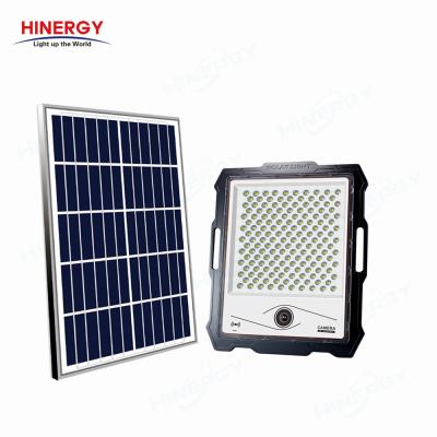 China Solar Residential Outdoor IP67 Motion Sensor Floodlight 100w 200w Led Street Flood Light With Solar Panel for sale