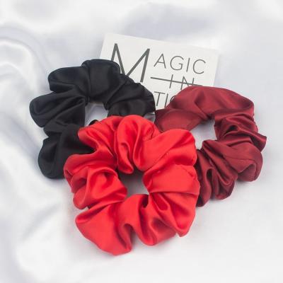 China Hot Custom Women's Elastic Hair Holder Ponytail Tie Hair Decoration Hair Scrunchies Sale Logo Scrunchies for sale