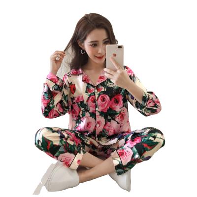 China QUICK DRY rushed yarn dyed techniques flannel fabric type material women's sleepwear imitate silk floral print rose pajamas for sale