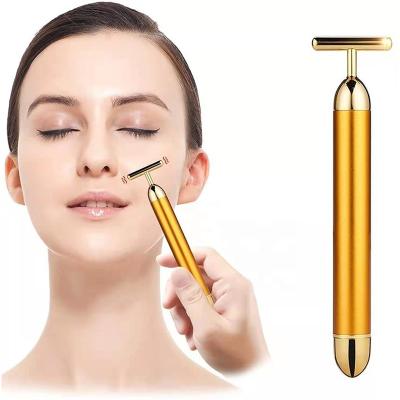 China 24k Gold Face Lift Energy Beauty Bar Massage Facial Skin Lifting Care T Shape Vibrating Face Roller for sale