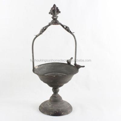 China Cheap antique brown metal french fashional country garden plant stand with bird for sale