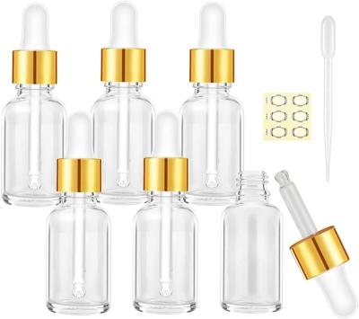 China Personal Care square glass bottle with dropper clear glass press pump head dropper bottle 30ml rectangle dropper bottle for sale