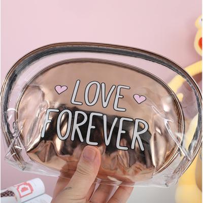 China Large capacity fashion ladies PVC clear bag travel makeup cosmetic bag two in one shinny women cosmetic bag set for sale