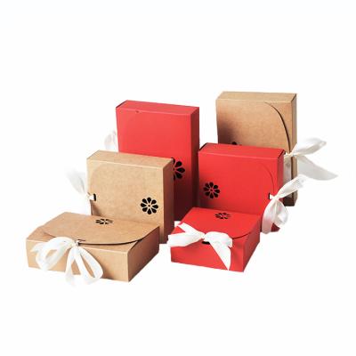 China Recyclable Factory Wholesale Custom Printed Cardboard Kraft Brown Red Christmas Cookie Folding Candy Sweet Packaging Boxes Ribbon Closure for sale