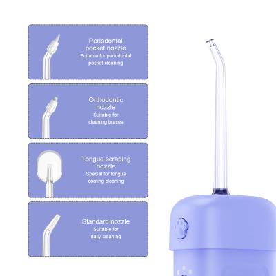 China Waterproof Car Diy Cartoon Children Water Flosser Four Kinds Of Small Professional Nozzles Water Selection Cordless Teeth Remover for sale