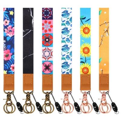 China Designer Durable Pu Leather Wrist Lanyard Keychain Custom Short Lanyards Wrist Strap Hand Lanyards for sale