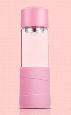 China Pink Insulated Glass Water Bottle Glass Drinking Bottle With Caps Lovely for sale