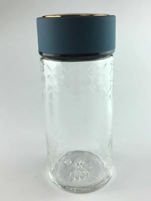 China Botella de agua de cristal no frágil reutilizable de la prueba de calor con la manija del silicón de la categoría alimenticia en venta