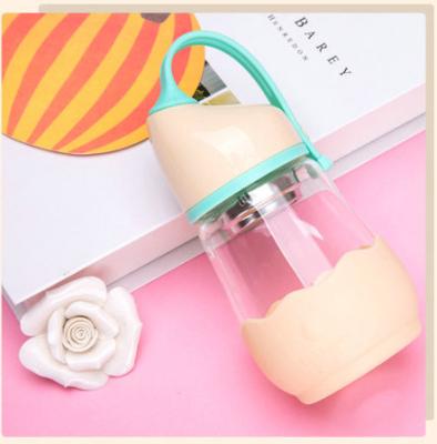 China Transparent Glass Newborn Baby Milk Bottle With Silicone Sleeve / Multi Color Handle for sale