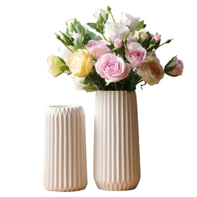 China Simple and creative flower arrangement white striped home origami vase southwestern ceramic decoration ornaments dry floral ornaments for sale