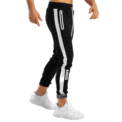 China Hot Flat Style Custom Fitted Mesh Panel Mens Track Pants White for sale