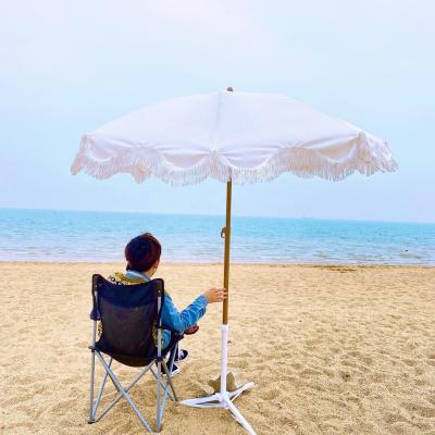 China Quality Traditional Luxury Outdoor Ovida 54inch Beach Umbrella Custom Tassels for sale