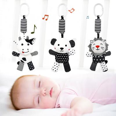 China Funny Hand Rattle White Plush Toy Black Baby Gift Newborn Plush Toy Rattle for sale