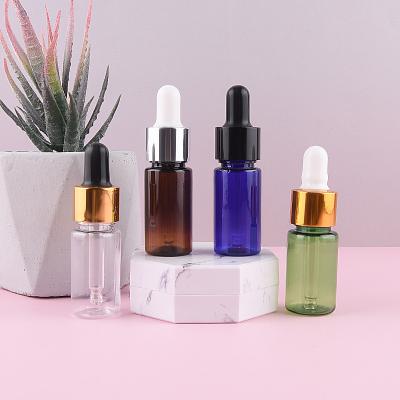 China Personal Care Essential Oil Serum Flat Shoulder Transparent Blue Green Brown Plastic Dropper Bottle With Pipette for sale