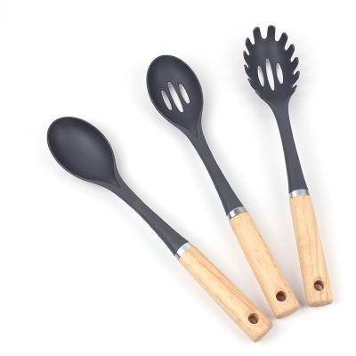 China China Sustainable Supplier Nylon Kitchen Utensils With Wooden Handle Stick Non Cooking Spoon 3pcs Set Custom Made for sale