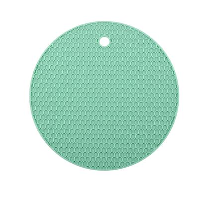 China Custom Color Stocked Non Slip Silicone Pot Holder Heat Resistant Round Dish Mat Honeycomb Silicone Tripod Mat for sale