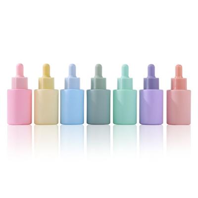 China 30ml Macarone Cosmetic Emulsion Essential Oil Cosmetic Glass Dropper Bottle for sale