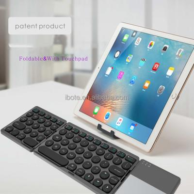 China Fashion Three Wireless Mini Keyboard 64 Keys Trackpad BT3.0 Times Keyboard For Apple Android Charging Wireless Keyboard for sale