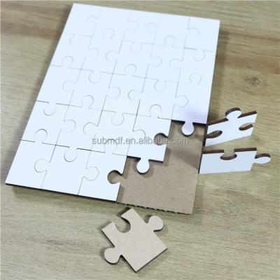 China DIY TOY Custom Printing HARDBOARD MDF PUZZLES A5 25 PIECES SUBLIMATION PUZZLE BLANKS for sale