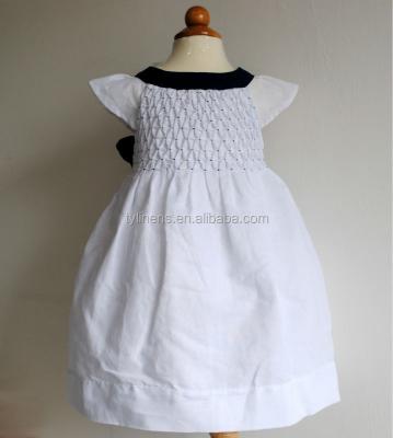 China Breathable Hot Sales Cotton Sleeveless Navy Canvas Bow Smocked Girl's Dress for sale