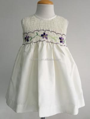 China Wholesale washable ivory color shantung kids smocked dresses with flower embroidery for sale