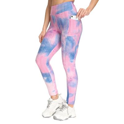 China Breathable Tie Dye Bubble Hip Raise Pants Jacquard Butt Lift Sports Women Yoga Slim Tight Leggings With Pockets for sale