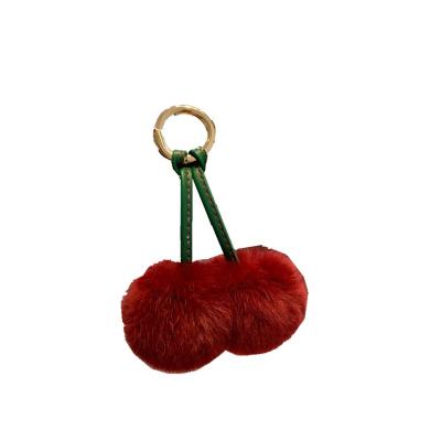 China New Real Rabbit Soft Hand Feeling Rabbit Fur Key Chain Cherry Bag Pendant Korean Ins Fashionable Cute Plush Ball For Gift for sale