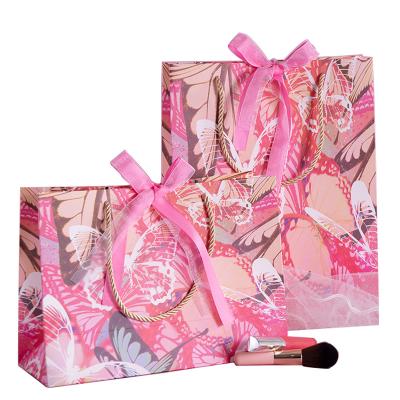 China Wholesale Customized Recyclable Fancy Colorful Butterfly Jewelry Cosmetics Shopping Clothing Kraft Paper Bag Handle Luxury Gift Box for sale