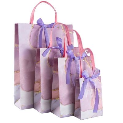 China Recycled Materials Recycled Wholesale Custom Printed Your Own Logo Packaging White Art Gift Shopping Paper Bag With Ribbon Handles Luxury Elegant for sale