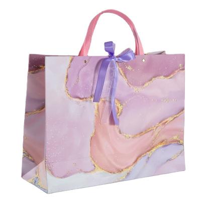 China High quality bag popular marble wholesale running materials paper reused custom logo and with double layer bow ribbon gift bags shopping for sale