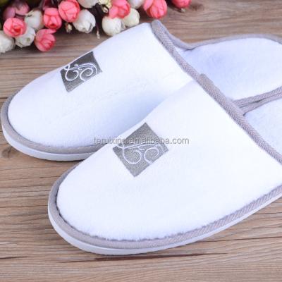 China FIVE STAR Hotel Slippers Disposable Cheap Anti-skid Bath Slipper White Slipper With Printing LOGO High Quality for sale