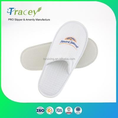 China Cotton Fabric Luxury Hotel Amenity Waffle High Quality Disposable Slippers White Bathroom Slipper for sale