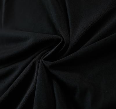 China Anti-static high quality pure black plush fleece fabric solid color super soft fabric puffs polyester for sale