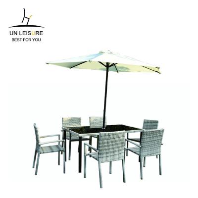 China Modern 6 seater KD rattan table set outdoor wicker side table garden rattan chair and table set with parasol for sale