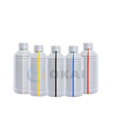 China DTF printine OKAI High Density Water based Pigment White dtf printer printing machine Printer Transfer Printing dtf ink 1000ml for sale