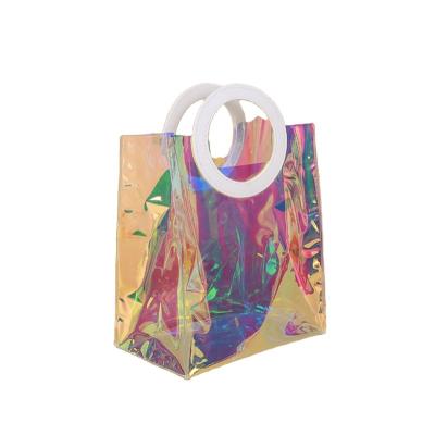 China Hot Sale Handled Transparent Handbags Beach PVC Tote Shopping Tote Bag Handbag Toy Bag Laser Clear for sale