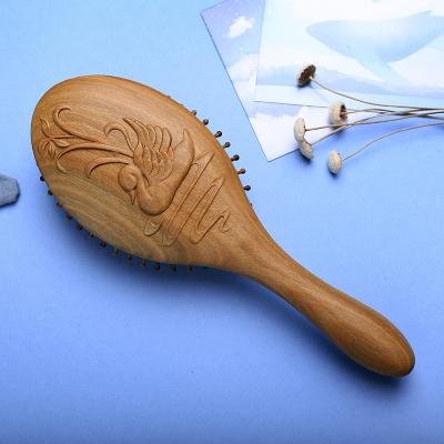 China Comfortable/Durable/Anti-Static Paddle Hair Brush Carved Vintage Chinese Comb With Soft Ball Head Air Cushion Comb Can Be Customized for sale