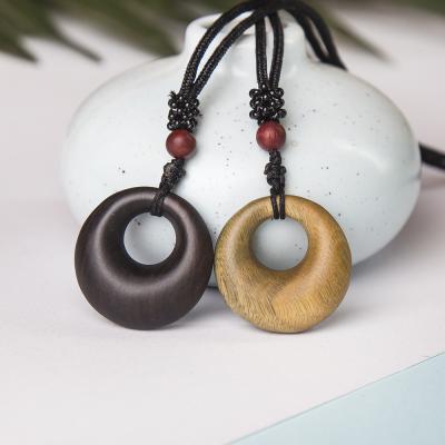 China Custom Retro China Style Ebony Wood Personality Sandalwood Necklace National Sweater Necklace Pendants for sale